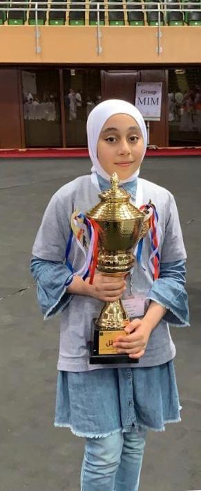 الطالبة سارة الأمير تحقق المركز الأول ولقب البطل في مسابقة الخوارزمي الصغير